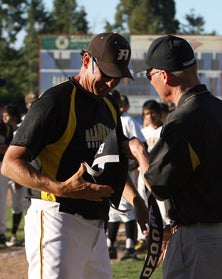 Alameda coach Ken Arnerich accepts
a second-place NCS ribbon from
2010.