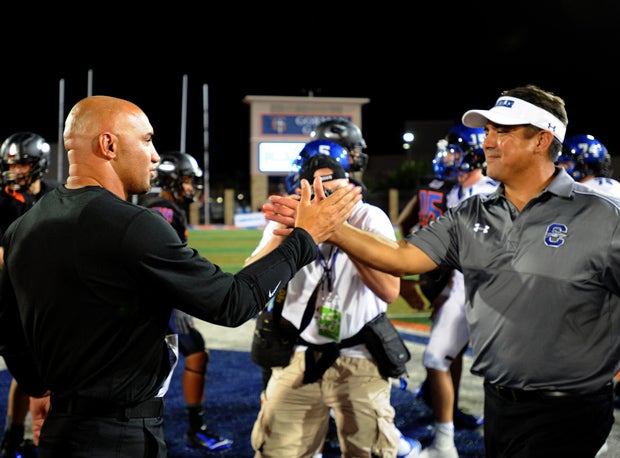 Bishop Gorman's Kenneth Sanchez and Chandler's Shaun Aguano shake hands after the game.