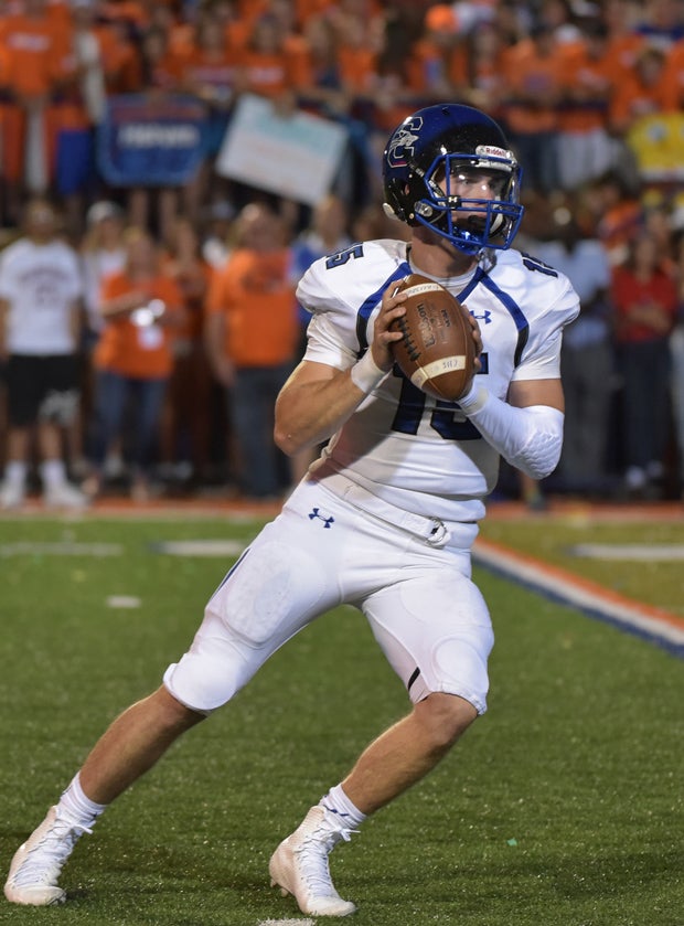 Chandler quarterback Mason Moran prepares to throw.