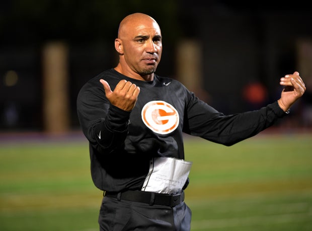 Bishop Gorman's Kenneth Sanchez encourages his players.