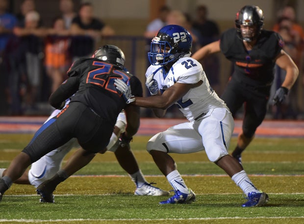 Chandler's Anthony Clay tries to block Bishop Gorman's Ikem Okeke.