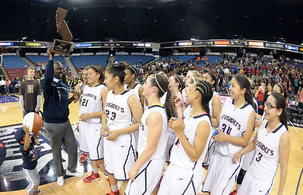Modesto Christian celebrates its hard-earned victory and title.
