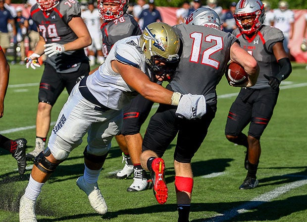 St. John Bosco's Sal Spina sacks St. John's quarterback Kevin Doyle. 