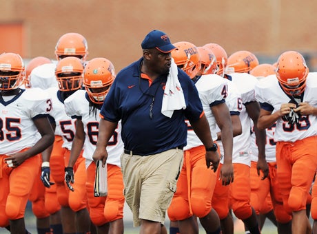 In his first season as head coach at Poly High in Baltimore, former NFL lineman and Super Bowl champion Larry Webster is leading teens not only onto the field but in the battlefield of life.