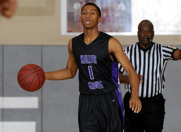 Point guard Keith Pinckney is one of 10 players back from last year's championship team at Miller Grove. The Wolverines have won five state titles in a row.