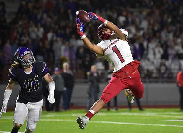 Receiver Jabez Tinae of Kennedy Catholic (Wash.) makes a fingertip, touchdown catch against Puyallup in a WIAA 4A District playoff game.