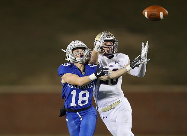 Rockhurst (Mo.) receiver Joseph Colt battles a Christian Brothers defender for a reception during the MSHSAA Class 6 Show-Me Bowl game.