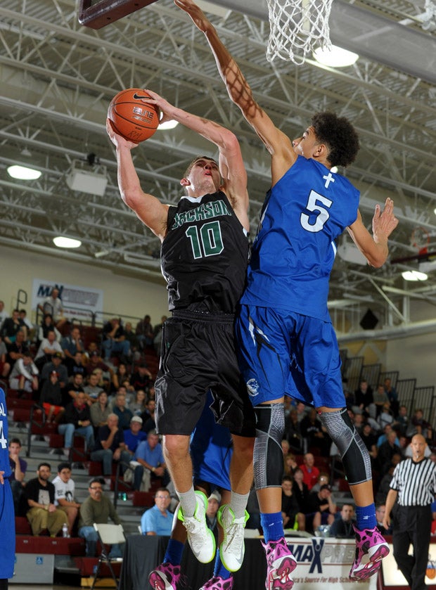 MaxPreps Holiday Classic Invitational Division MVP Jason Todd (10) goes up against Michigan-bound D.J. Wilson.