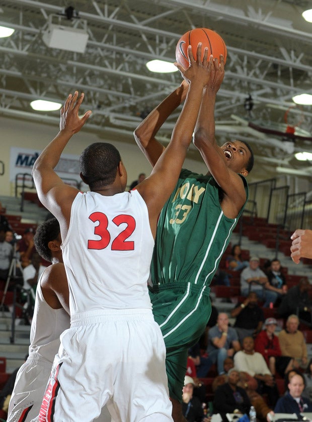 Long Beach Poly's Drew Buggs (23) in 68-65 loss to Westchester in the third-place game of the Invitational Division.