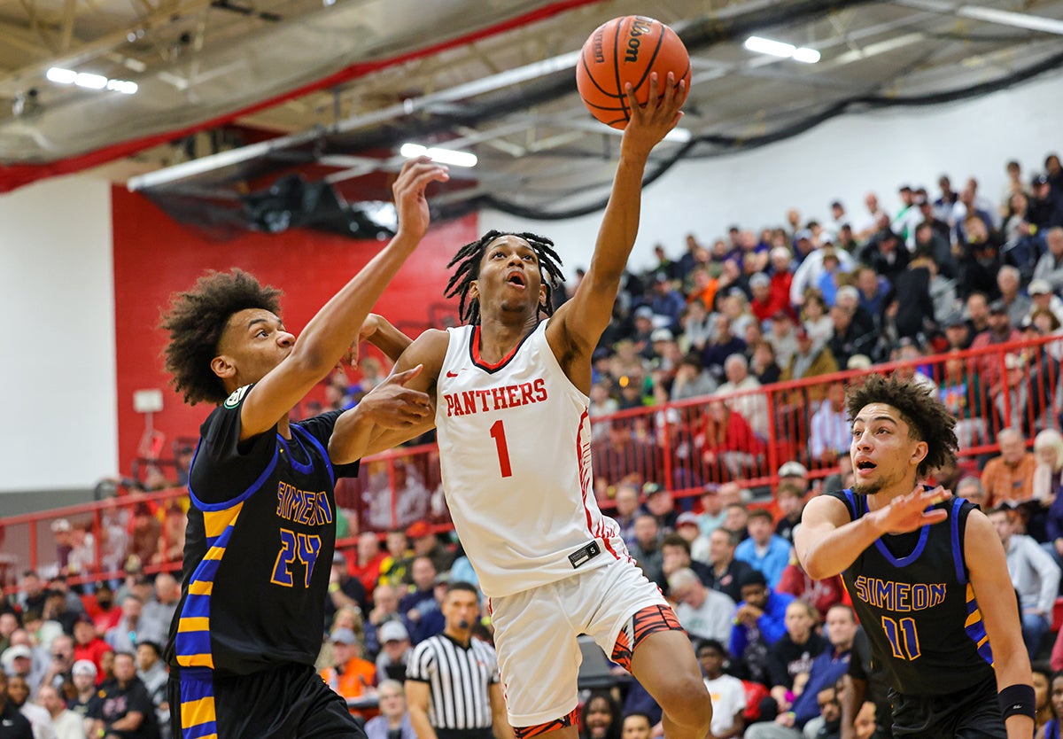 Imhotep Charter junior Ahmad Nowell drives to the rim in the Highland Shootout on Saturday. (Photo: Jim Simmons)