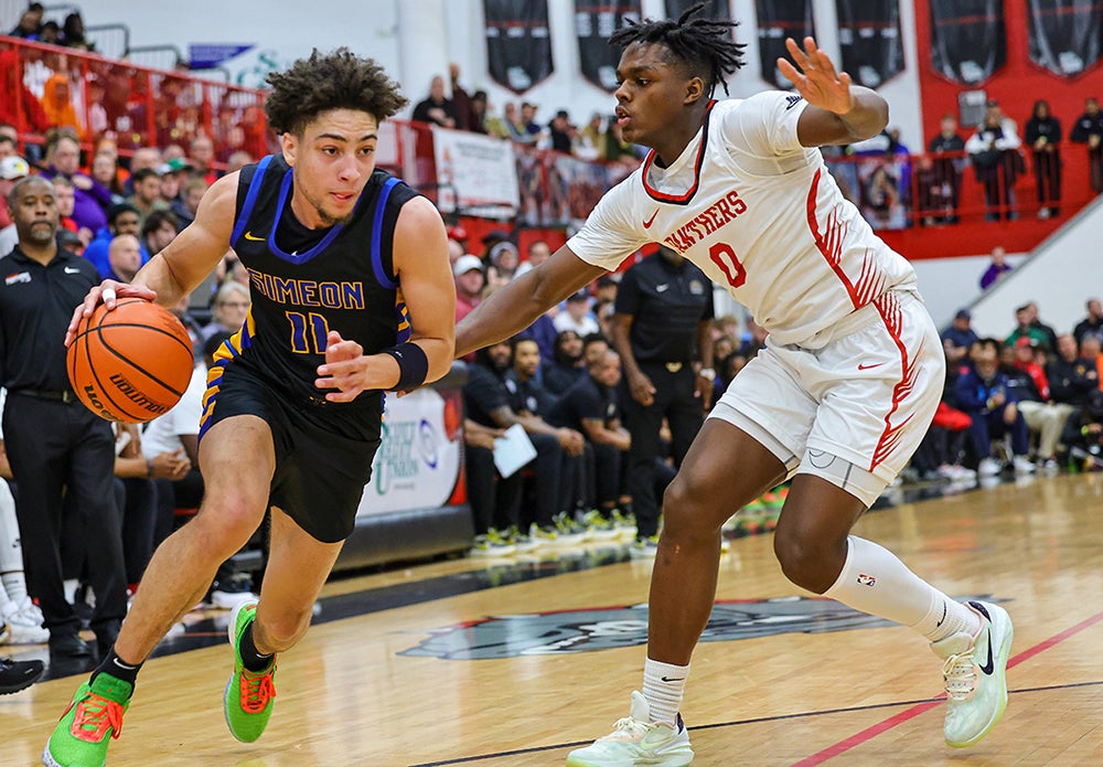 Simeon junior Sam Lewis scored 12 points in the Wolverines win over No. 8 Imhotep Charter on Saturday. (Photo: Jim Simmons)