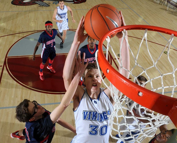 A Pleasant Grove (Utah) player soars in for a dunk during a game against Great Oak (California) at the MaxPreps Holiday Classic in December.