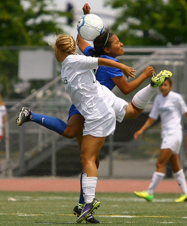 A Christian Brothers player squares off with a Manteca player for a header during the California Interscholastic Federation Sac-Joaquin Section Division 3 championship game in May.