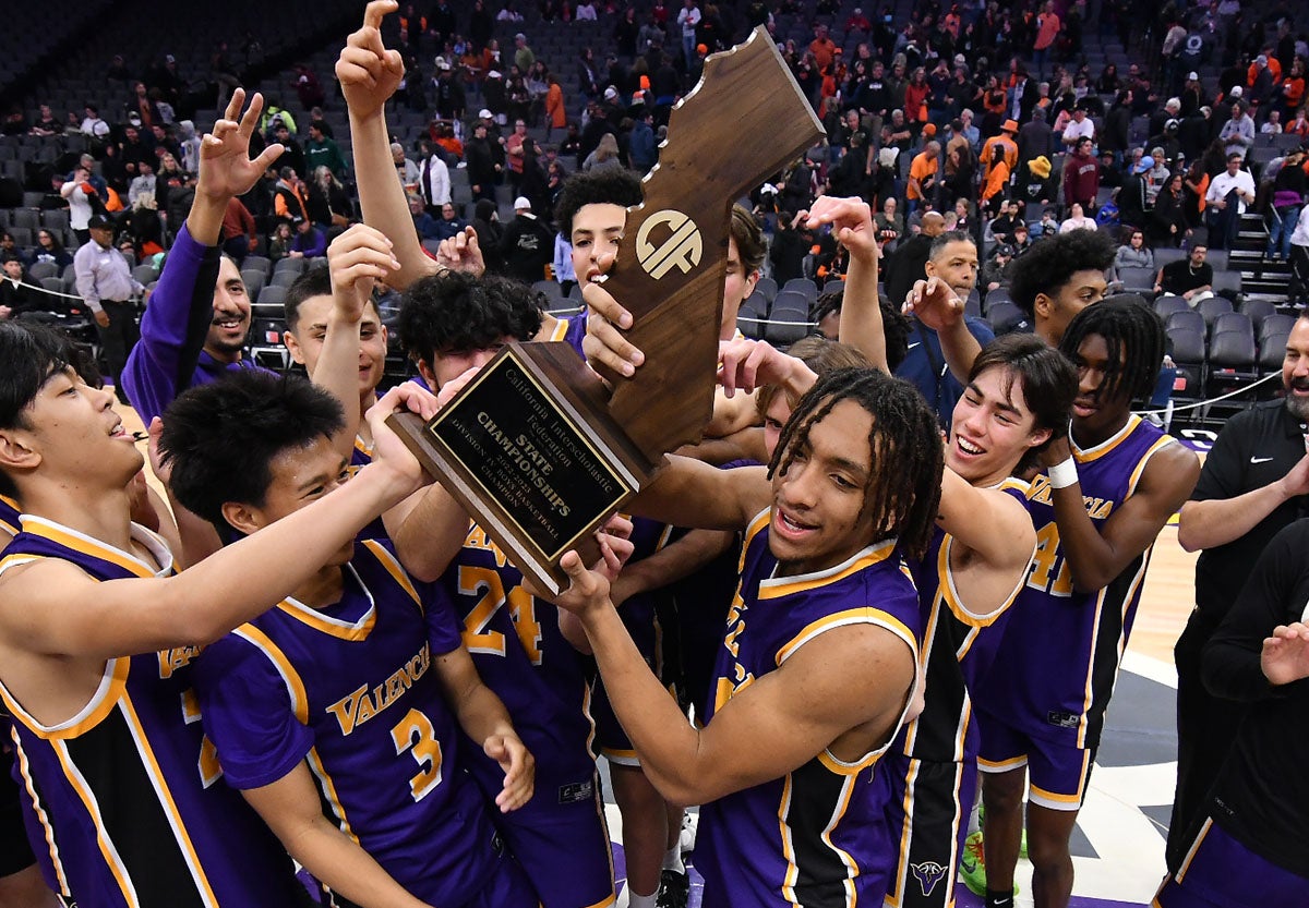 Valencia celebrates its first CIF State championship after defeating Half Moon Bay 89-59 on Saturday at the Golden 1 Center.
(Photo: David Steutel)
