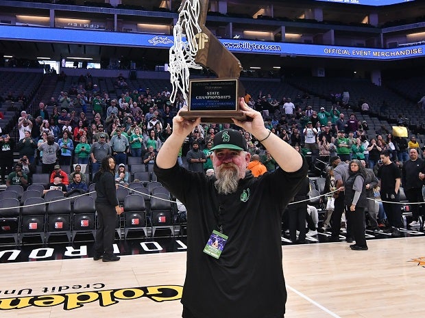 St. Bernard's coach Matt Tomlin is the first state coach to win a girls basketball title and a football title. He led the Crusaders to a Division IV win on Saturday to match St. Bernard's 6-AA football title in 2019. (Photo: David Steutel)