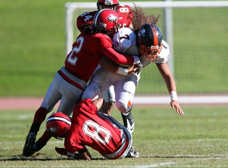 Washington's defense hit hard all day, including this crunch of Pulusian.