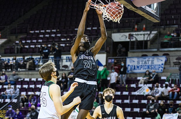 Baye Fall throws down a dunk in last year's Colorado Class 3A state championship game.