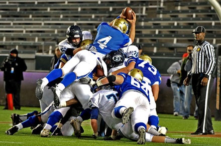Santa Margarita junior quarterback Johnny Stanton goes up for game-winning touchdown with 16 seconds left.