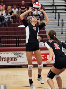 Katy Beals (4) sets Kaci Eaton for
Lake Travis.