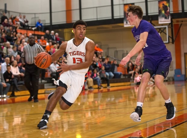One of the hottest unsigned seniors in America, Edwardsville guard Mark Smith is averaging 21.8 points, 8.6 assists and 8.0 rebounds per game for the 24-1 Tigers. 