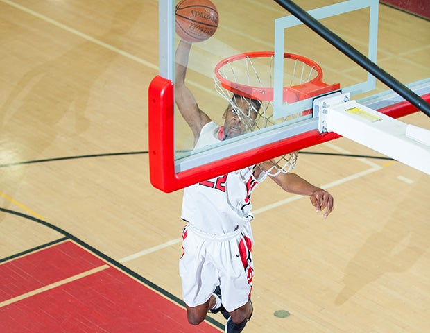 Jordan McGlory of James Logan (Calif.) soars in for a dunk against American High School. 