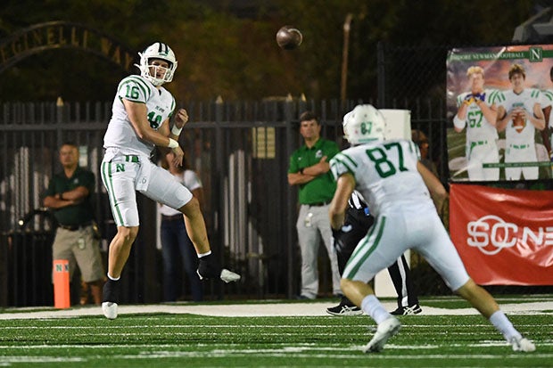 Newman junior quarterback Arch Manning throws to tight end Will Randle during first-half action against Berkeley Prep.