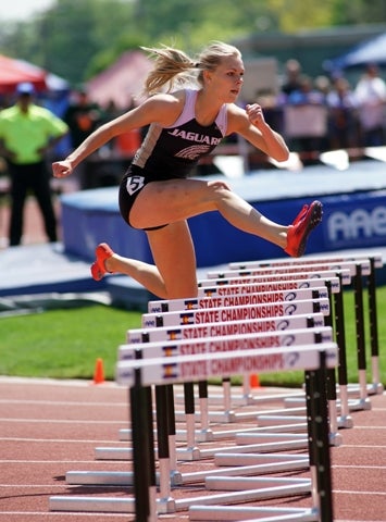 Emily Sloan of Rock Canyon set a state record in the
300-meter hurdles at the Class 5A state meet, to finish
with six hurdles titles in her career.
