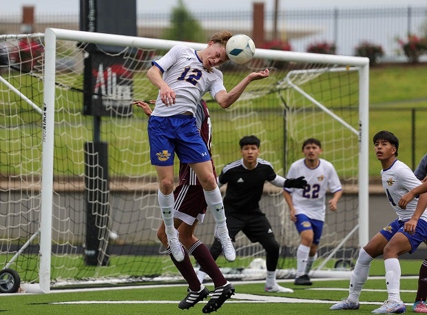 Jacksonville senior Dylan Roberts heads the ball in a UIL 4A state soccer regional final against Palestine. (Photo: Robbie Rakestraw)