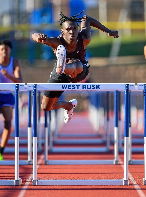 R.J. Garrett of Jefferson clears the last hurdle on his way to winning the Texas 16AAA District 110-meter hurdles.(Photo: Wayne Grubbs)