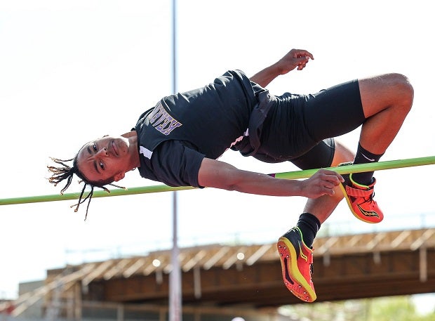 Kearney's Tre Smith clears the high jump bar during the Gary Parker Invitational in Blue Springs, Mo. (Photo: David Smith)