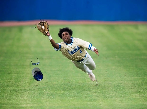 The Vandebilt Catholic center fielder lays out for a sinking liner in a game against E.D. White. (Photo: Brad Weimer)