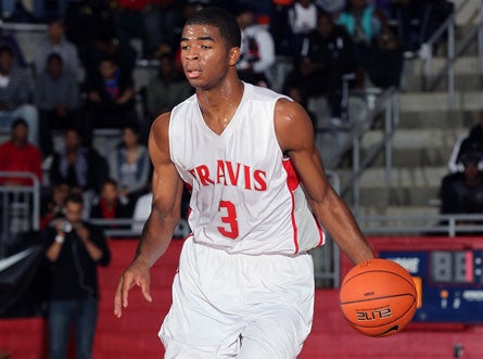 Junior Aaron Harrison is leading Fort Bend Travis in scoring this season at 18.8 points per game.