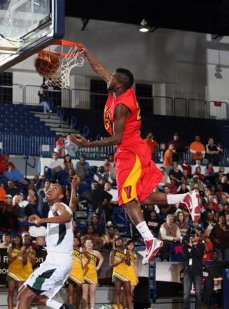 Yates' Brandon Peters dunks against Butler.