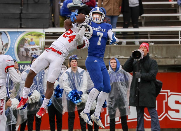 East safety Jaylon Vickers leaps to make an interception in front of Bingham receiver Brayden Cosper.