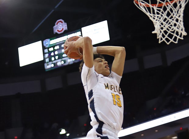 Moeller senior Jaxson Hayes (Texas) slams home two points during the Crusaders D-I semifinal win over Lorain. 