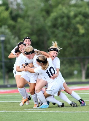 Aquinas won a girls soccer title in Kansas.