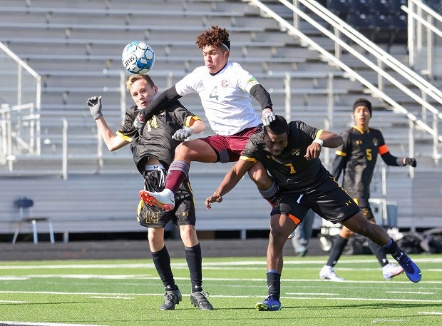 Our January Photo of the Month features players scrambling for the ball during a 2-2 draw between Ennis and Crandall at the Forney Kickoff Tournament.
