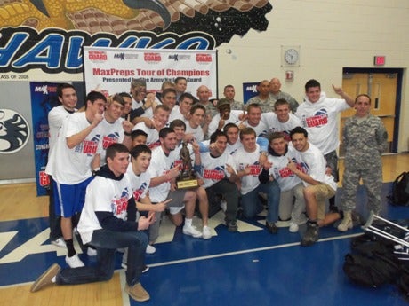 Ironwood Ridge players celebrate after receiving the Minuteman Trophy.