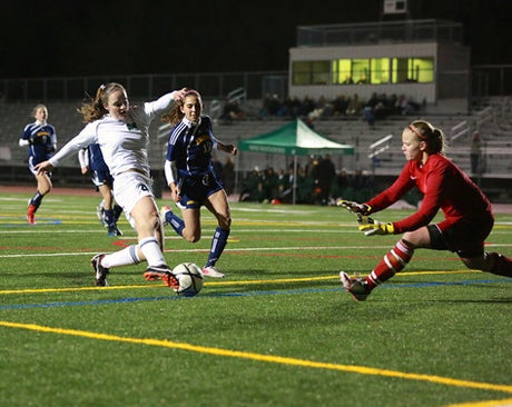 Megan Reid's prowess as a two-sport star is spectacular. Factor in that both sports play in the same season, and it's that much more remarkable.