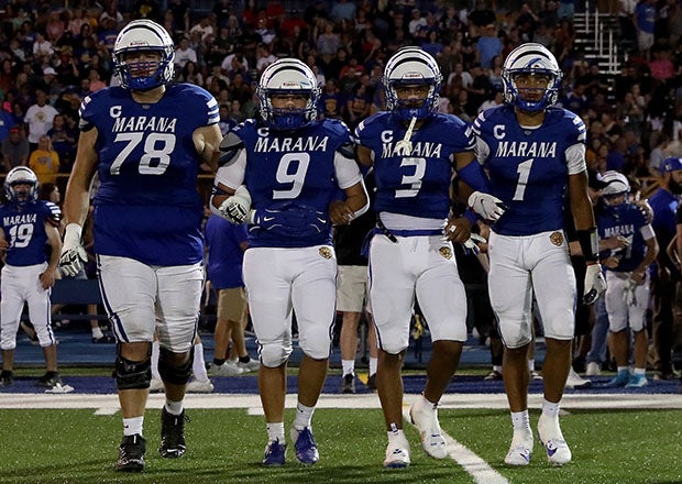Arizona Player of the Year Dezmen Roebuck (1) takes the field with fellow Marana captains prior to a September game against Higley. (Photo: Chris Hook)