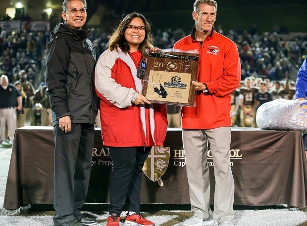 Jeff Steinberg accepting the title plaque after Rancho Verde beat St. Francis in the CIF playoffs.