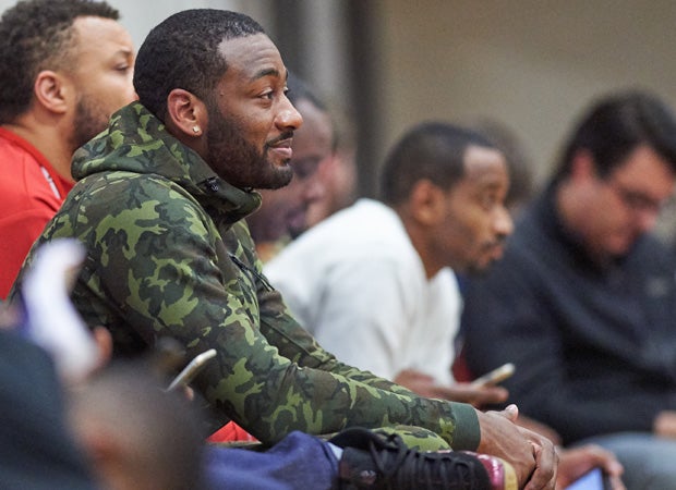 Washington Wizards guard John Wall watches the action Thursday night between Hillcrest and Cannon.
