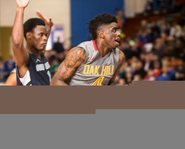 Dwayne Bacon (with ball) led Oak Hill Academy past Our Savior New American in a battle of Top 25 teams at the Marshall County Hoopfest in Kentucky.