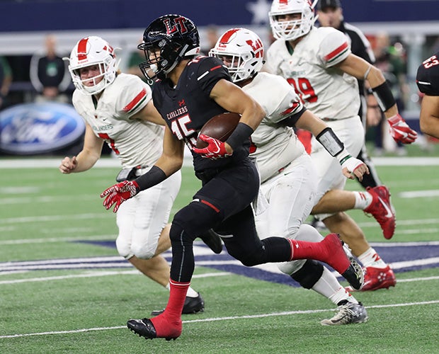 Lake Travis running back Maleek Barkley carries during the first half.