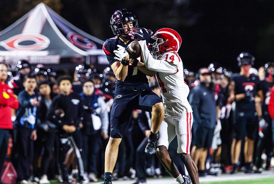 Mater Dei's Jaylen Grier (right) tries to breakup a pass thrown to Centennial's Gavin Lorge in last year's CIF Southern Section Division 1 semifinal. The Monarchs and Huskies renew their rivalry Friday in the MaxPreps Game of the Week. (PHOTO: Scott Padgett)