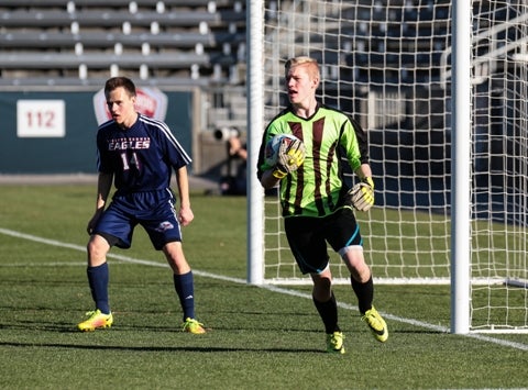 Liberty Common goalkeeper Michael Bradley, right, has registered four shutouts in the postseason to help the Eagles return to the Class 3A state championship game. Four state title games will be played during the next two days.