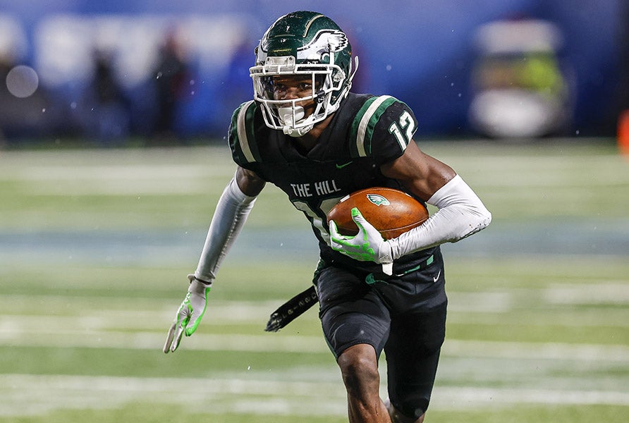 Travis Hunter caught 10 passes for 153 yards and a score in Collins Hill's 24-8 win over Milton in the 2021 Georgia Class AAAAAAA state championship game. He also recorded four tackles and forced a fumble defensively. (PHOTO: Cecil Copeland)