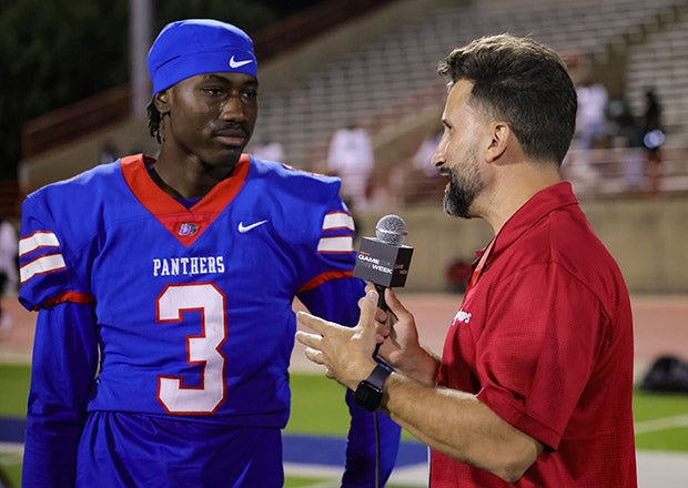 Duncanville quarterback Maximus The Great Denson is interviewed by MaxPreps Game of the Week sideline report Chris Stonebraker following Friday night's win. (PHOTO: Lynn Fern)