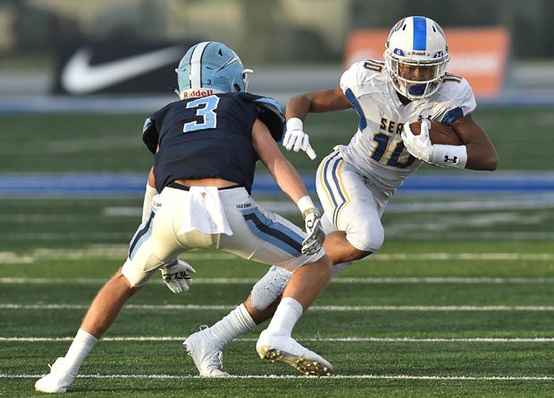 Action from the last day football was played in California, Dec. 14, 2019, when Corona del Mar defeated Serra 35-27 in the CIF D1-A title game.