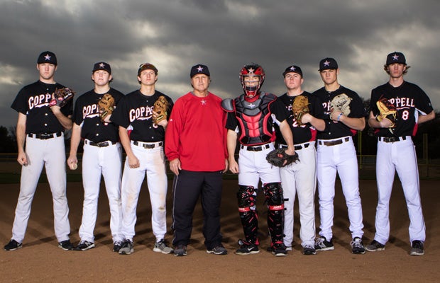 Head coach Kendall Clark (red jacket) has one of the deepest pitching staffs in the country.